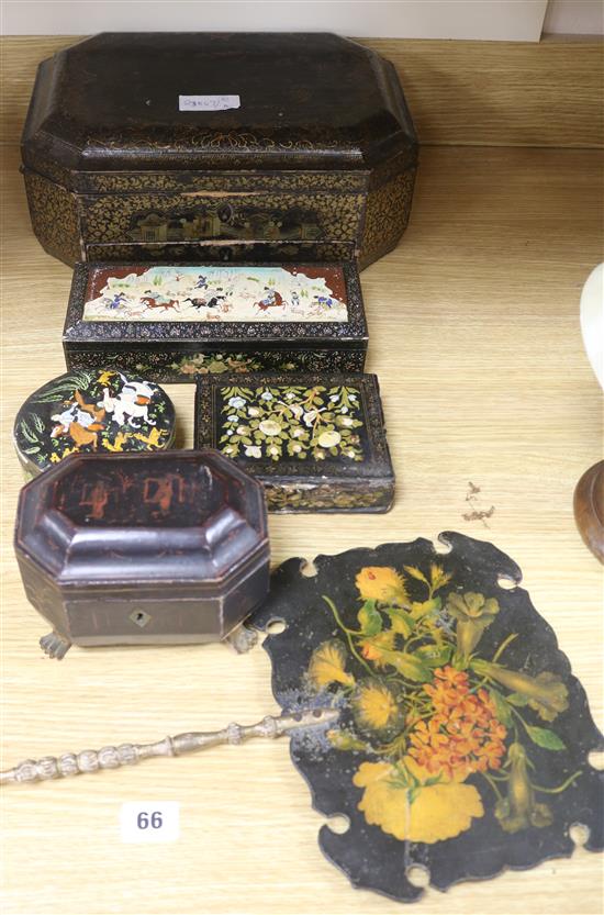 A collection of lacquer boxes and a face fan